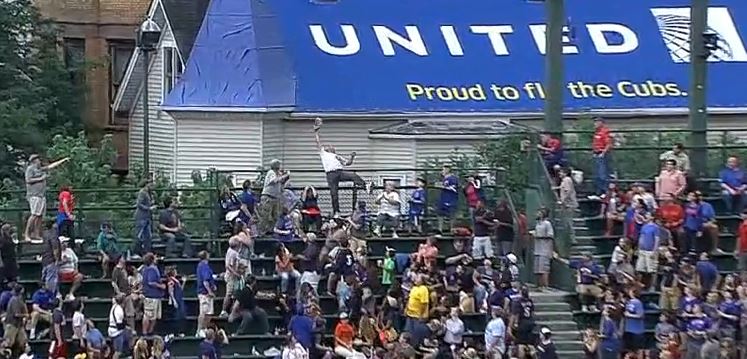 Old Cubs fan catches home run ball, throws ball back (Video)