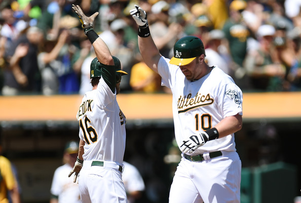 Adam Dunn homers in debut, A’s defeat Mariners