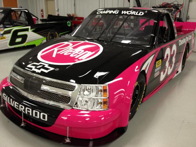 Cale Gale helps paint Martinsville curbs pink