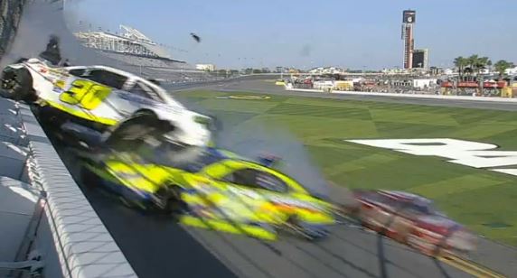 Big Wreck during NASCAR practice, car hits catchfence (Video)