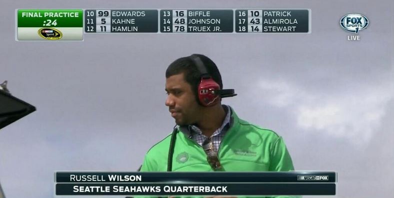 Russell Wilson appears at NASCAR practice at PIR