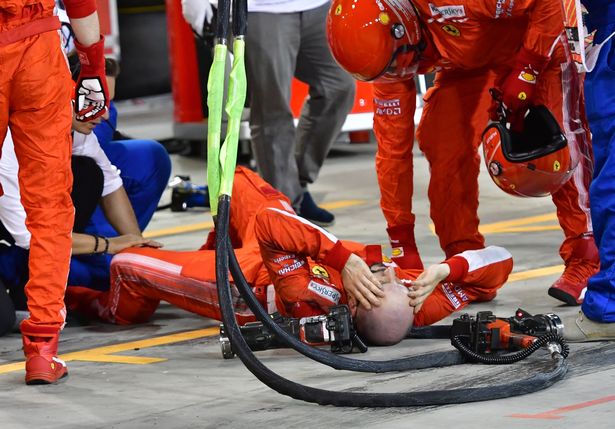 Watch: F1 star Kimi Raikkonen breaks leg of pitcrew member