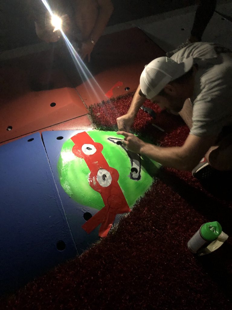 Corey LaJoie paints Ninja Turtle at Roval