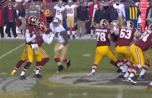 Robert Griffin takes kick to the groin from Aldon Smith (Video)