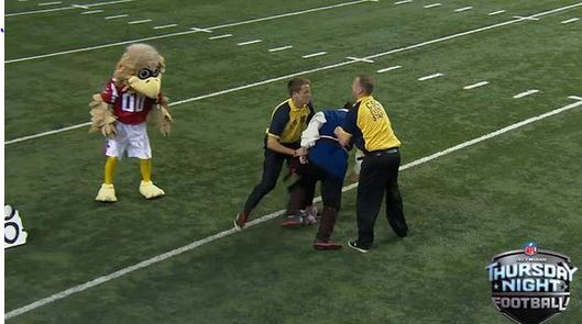 Falcons mascot takes out Buccaneers fan running on field