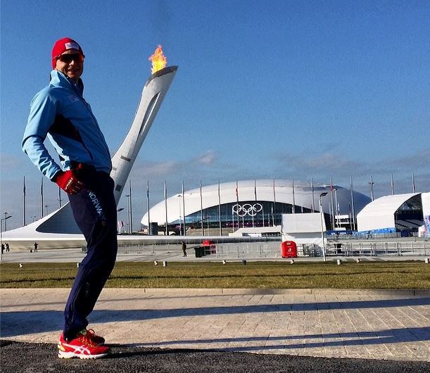 Harvard Bokko of Norway posed with the Olympic Flame (Photo)