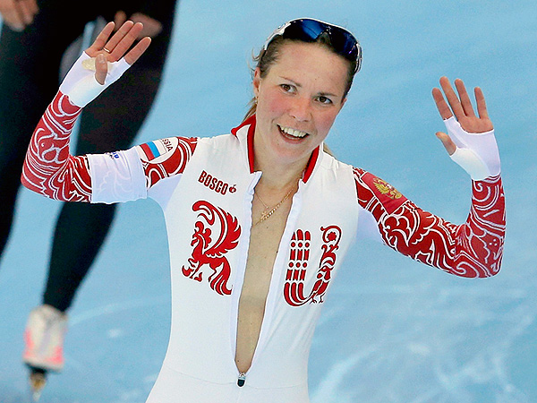 Olga Graf of Russia celebrates bronze medal win with wardrobe malfunction (Video)