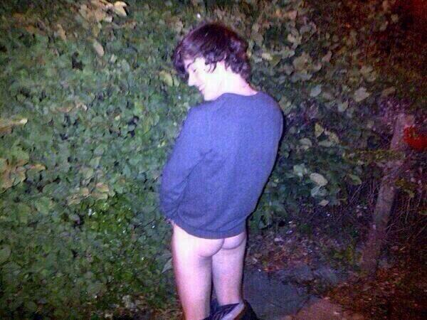 Harry Styles peeing on bush
