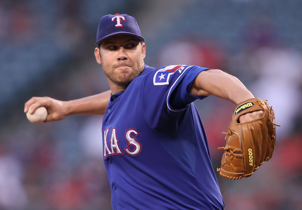 Colby Lewis to begin rehab assignment next week