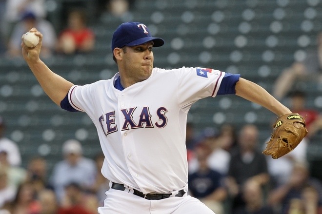 Rangers re-sign Colby Lewis to minor league deal