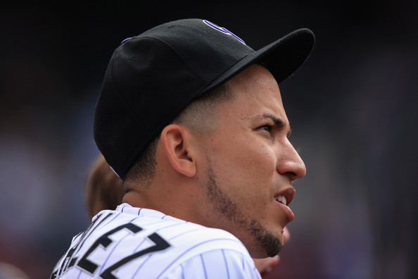 Rockies keeping Carlos Gonzalez in left field, holding tryout for center