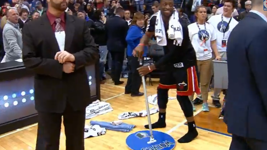 Dwayne Wade videobombs Lebron James with a mop (Video)