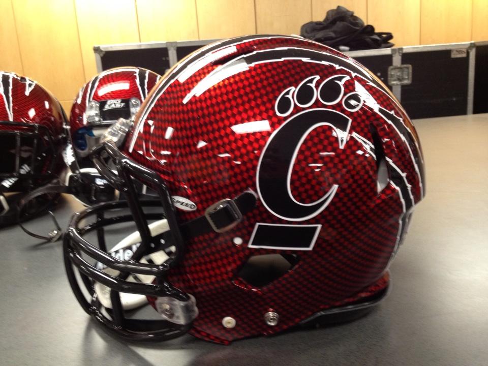 Cincinnati unveils special helmets for bowl game