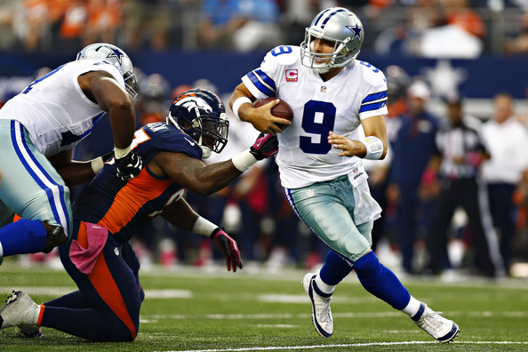 Tony Romo sets Cowboys record for passing yards, throws game deciding interception