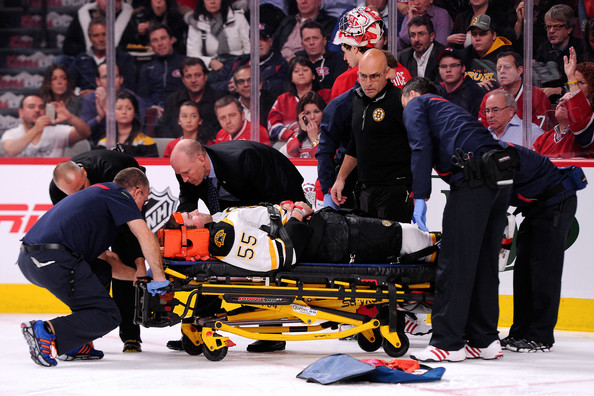 Johnny Boychuk taken off ice on stretcher after hit (Video)