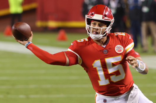 KANSAS CITY, MISSOURI - SEPTEMBER 10: Patrick Mahomes #15 of the Kansas City Chiefs throws a touchdown pass against the Houston Texans during the second quarter at Arrowhead Stadium on September 10, 2020 in Kansas City, Missouri. (Photo by Jamie Squire/Getty Images)
